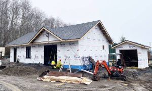Volunteers made quick work on the new Jehovah’s Witnesses Kingdom Hall in Port Clements. On Jan. 12, after working on the structure for 10 days, it already looked like a building. (Photo: Courtesy of Jehovah’s Witnesses)